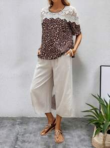 EMERY ROSE Conjunto de dos piezas para mujer de verano casual con parte superior de manga corta con encaje de flores dispersas y cuello redondo empalmada, y pantalón largo sólido con bolsillos