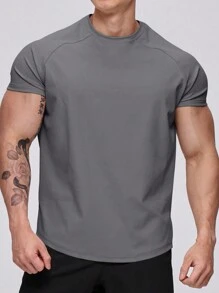 Manfinity Fitness Camiseta deportiva de manga corta para hombres - entrenamiento y gimnasio y ejercicio, casual de compresión que absorbe la humedad y se seca rápido, ajuste regular en gris oscuro de cuello redondo con gran elasticidad - estilo de novio camiseta deportiva de verano de unicolor para hombres, camiseta de gimnasio transpirable