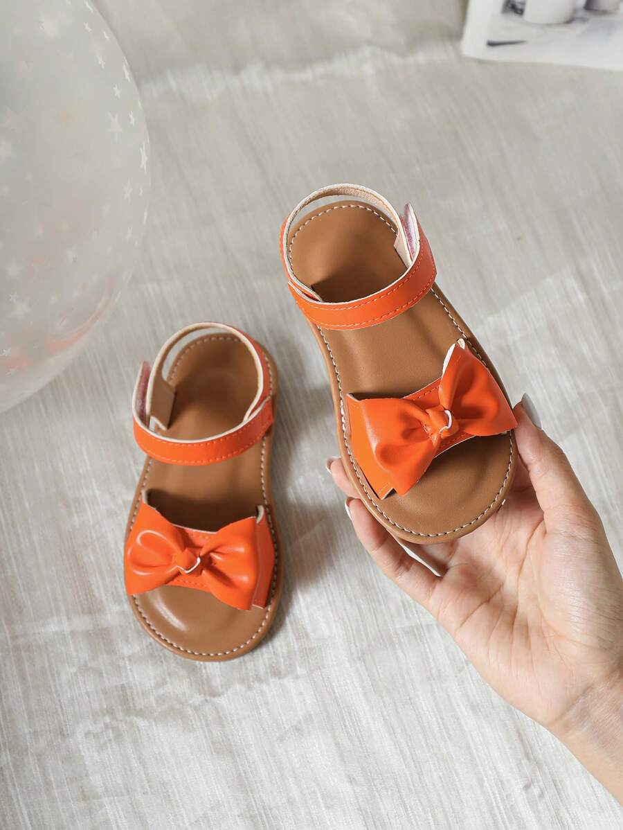 新款夏季幼兒女孩可愛開式蝴蝶結軟底涼鞋，多功能時尚嬰兒女孩海灘鞋 - 橘色 - 查看 1