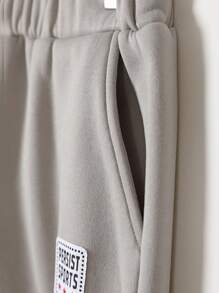 SHEIN 青少年男孩字母图案翻盖口袋侧抽绳腰部运动裤