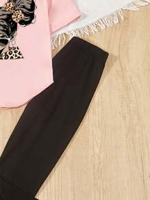 SHEIN GraphicGems Conjunto de camiseta gráfica con figuras y dobladillo curvo y mallas para niña preadolescente
