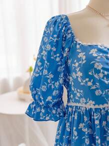 Soleia Robe d'été décontractée en grande taille pour femmes, avec col en V, manches bouffantes, empiècement en dentelle, taille marquée, jupe plissée et imprimé floral