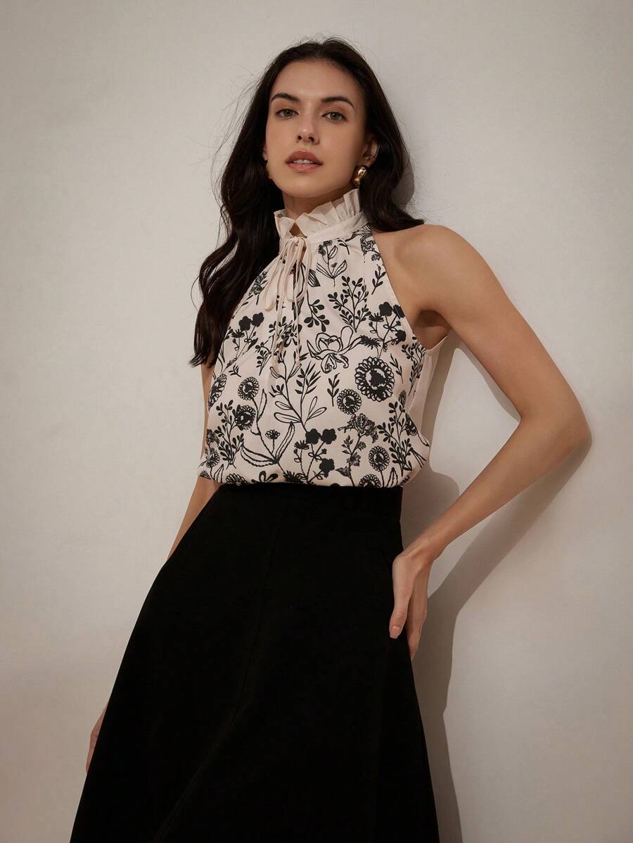 Chiquease Minimalist Floral Print Sleeveless Blouse With V-Neckline, Tie Fastening And Frill Detailing - Multicolor - View 1