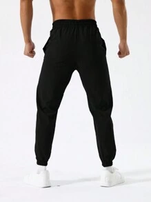 Manfinity Sport Corelite Boyfriend Style Men Letter Print Drawstring Waist Sports Pants Back To School Sweat Pants - Black - View 2