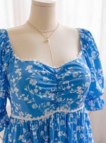 Soleia Robe d'été décontractée en grande taille pour femmes, avec col en V, manches bouffantes, empiècement en dentelle, taille marquée, jupe plissée et imprimé floral