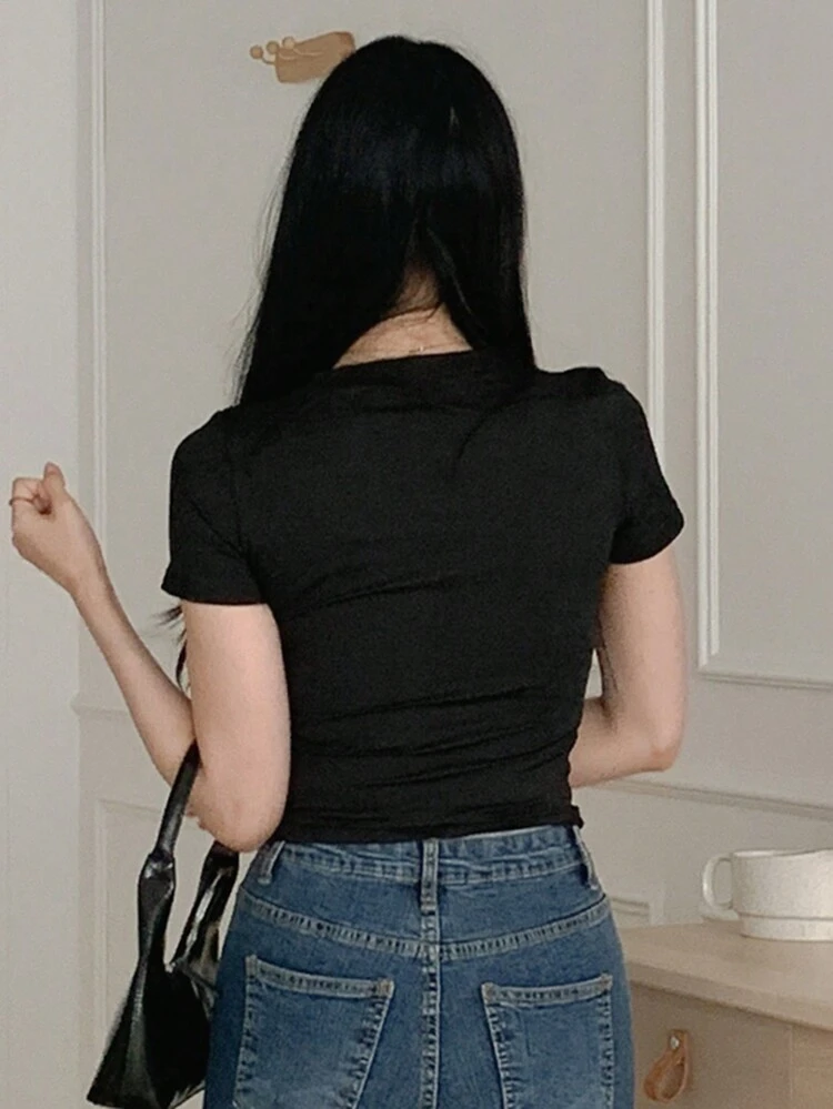 Tee-shirt à manches courtes avec broderie de nœuds