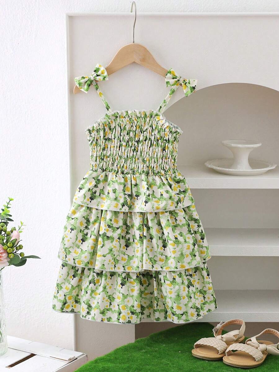 SHEIN Thời gian vui chơi trên bãi biển dành cho các cô gái Phong cách vẽ tranh giản dị Váy bánh nhiều lớp có dây buộc hoa có nơ, hoàn hảo cho những ngày nghỉ bên bờ biển - màu xanh lá - Xem 1