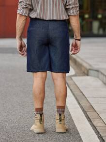Manfinity Homme Pantalones cortos de mezclilla para hombre con bolsillos con solapa
