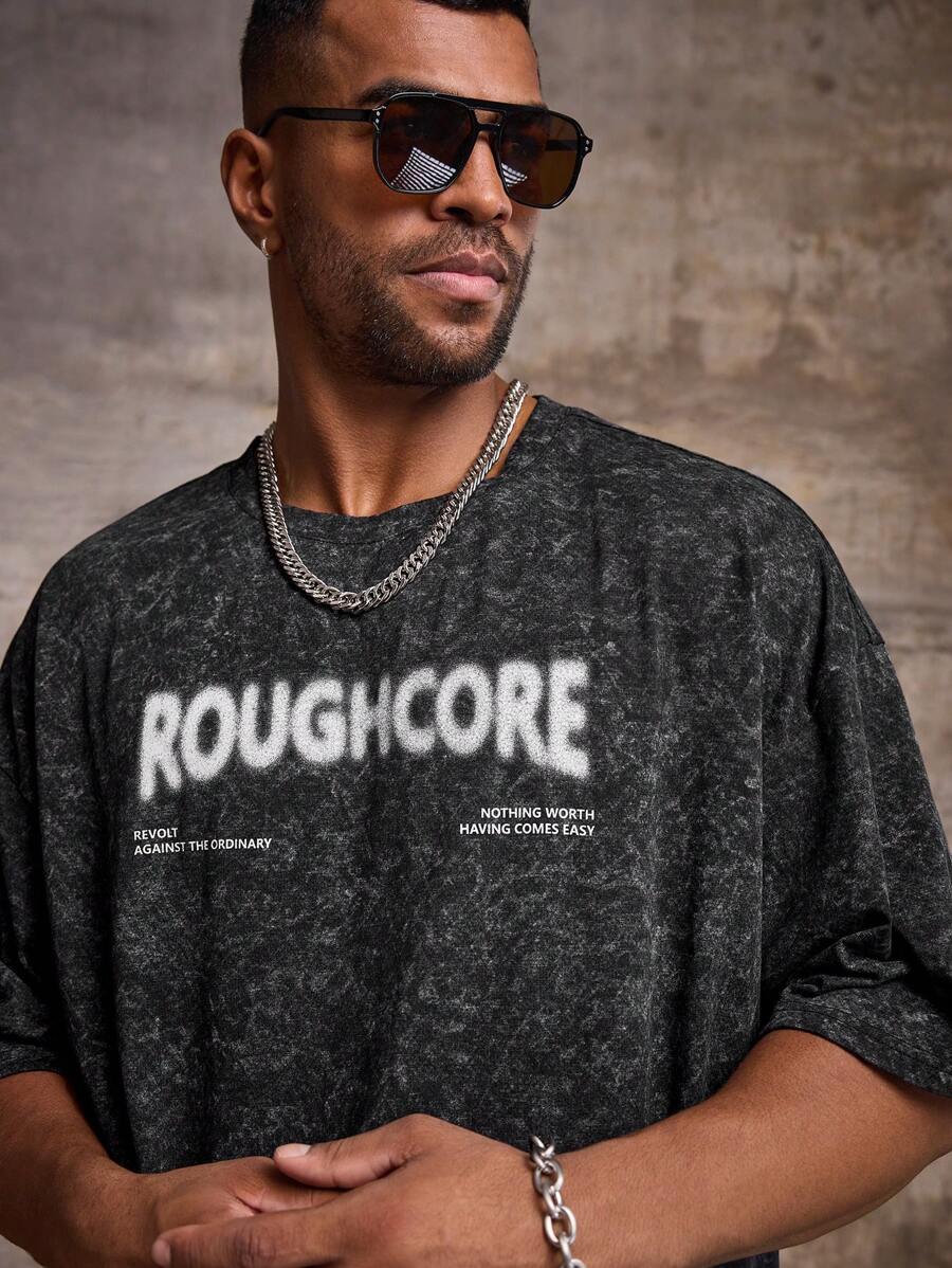 Manfinity Roughcore Maglietta da uomo oversize con stampa di lettere, scollo rotondo, manica raglan, adatta per l'estate - nero - Visualizzare 1