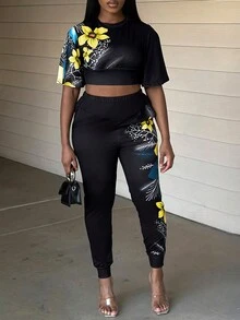 LovelyWholesale Conjunto pantalones con top de manga con volante con estampado floral - Negro - Ver 4