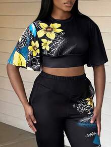 LovelyWholesale Conjunto pantalones con top de manga con volante con estampado floral - Negro - Ver 7