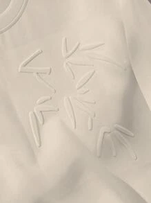Manfinity Hypemode Camiseta holgada masculina con hombro caído y estampado de plantas en relieve
