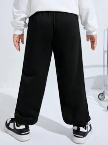 SHEIN Kids/Tween Boys' Extended Size Casual Night-Glow Green Printed Loose Fit Knitted Solid Color Sweatpants Trousers