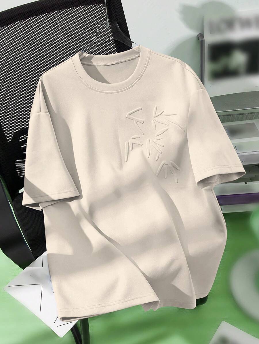 Manfinity Hypemode Camiseta holgada masculina con hombro caído y estampado de plantas en relieve