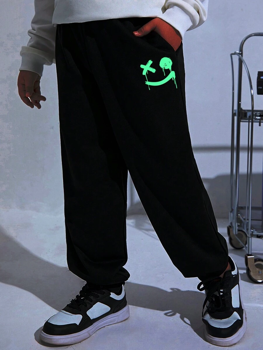 SHEIN Kids/Tween Boys' Extended Size Casual Night-Glow Green Printed Loose Fit Knitted Solid Color Sweatpants Trousers
