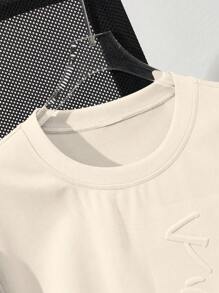 Manfinity Hypemode Camiseta holgada masculina con hombro caído y estampado de plantas en relieve