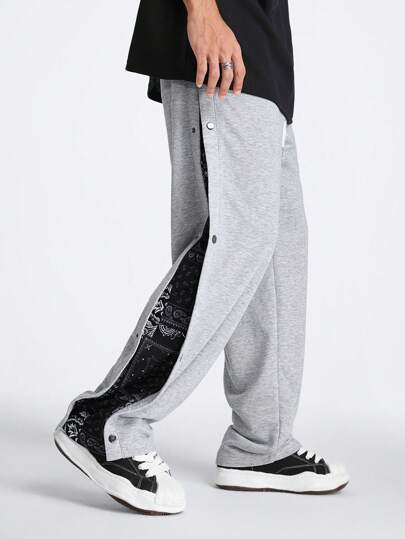 Manfinity VCAY Joggers largos tejidos y rectos para hombres con impresión digital en el costado