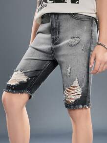 SHEIN Pantalones cortos vaqueros negros informales de verano con efecto desgastado, rasgado y con borde deshilachado para niños preadolescentes