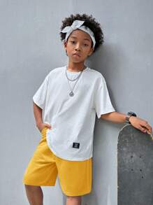SHEIN Áo thun ngắn tay cổ tròn phong cách đường phố thường ngày dành cho bé trai Tween có in chữ và quần short màu trơn Bộ đồ dệt kim - Màu vàng - Xem 3