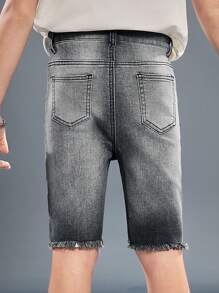 SHEIN Pantalones cortos vaqueros negros informales de verano con efecto desgastado, rasgado y con borde deshilachado para niños preadolescentes