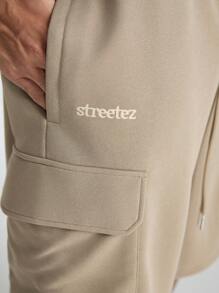 Manfinity NXTstreet Pantalones cortos tejidos holgados para hombre con doble bolsillo lateral, adecuados para el verano - Caqui - Ver 2