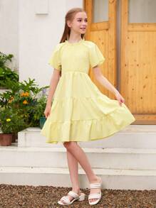 Vestido de línea A con cuello redondo, mangas con volantes y cintura elástica en unicolor tejido, adecuado para salidas y vacaciones de verano para niñas preadolescentes - Mostaza Amarilla - Ver 7
