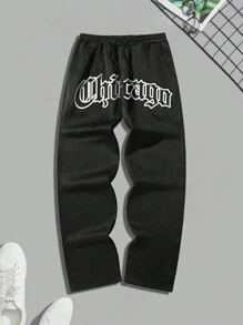 Manfinity Roughcore 男士加大尺寸字母印花慢跑短褲