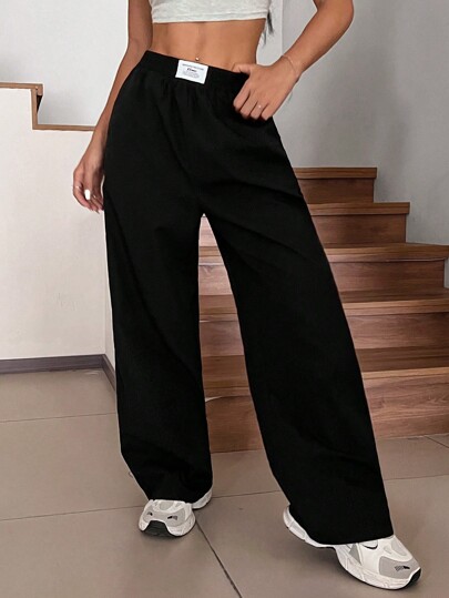 SHEIN EZwear Pantalones rectos y sueltos de pierna ancha de color negro con estampado tipo zhanga para vacaciones de primavera y verano