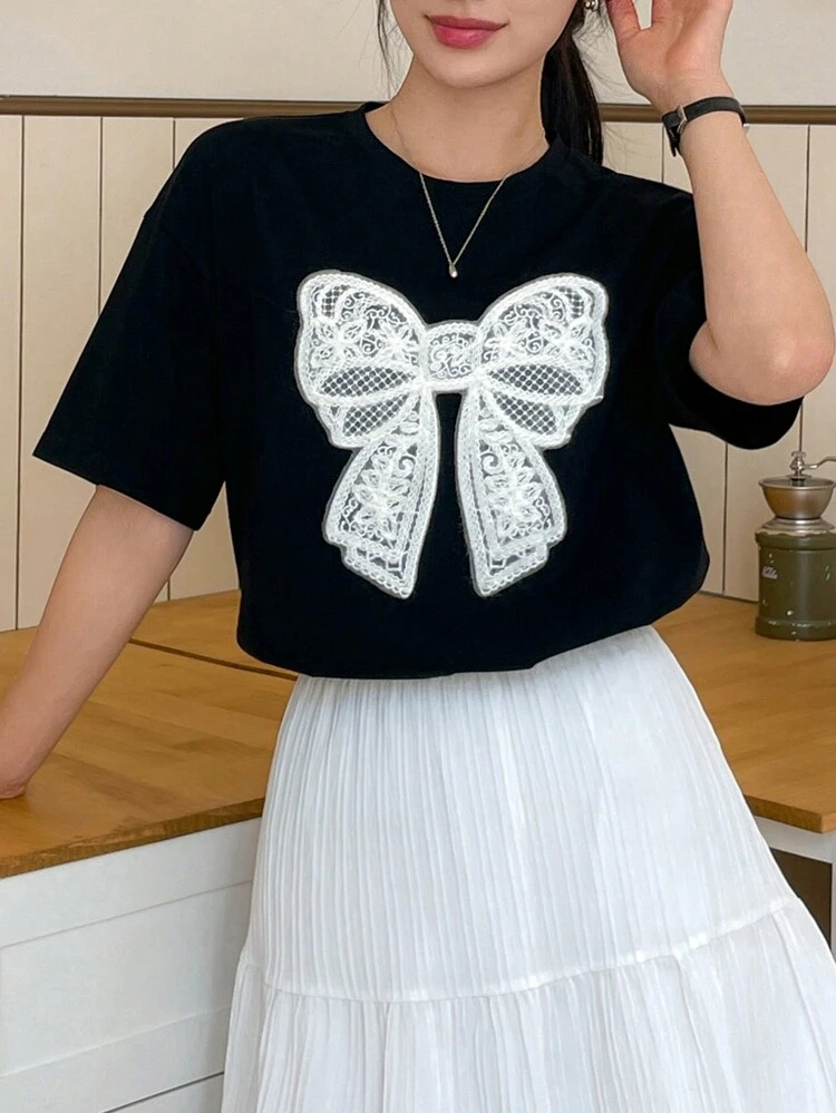 SHEIN X AYA NAKAMACHI Women's Summer Loose Fit Casual T-Shirt Top With Bowknot Print, Round Neckline And Dropped Shoulders