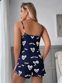 Conjunto de pijama de camiseta de tirantes y pantalón corto con estampado de corazones y pestañas