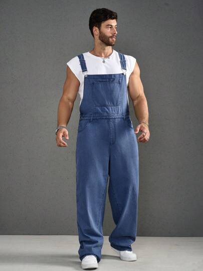 Manfinity Homme شراشف دنيم للرجال ذوي الحجم الكبير باللون الصلب مع جيوب، بدون أكمام