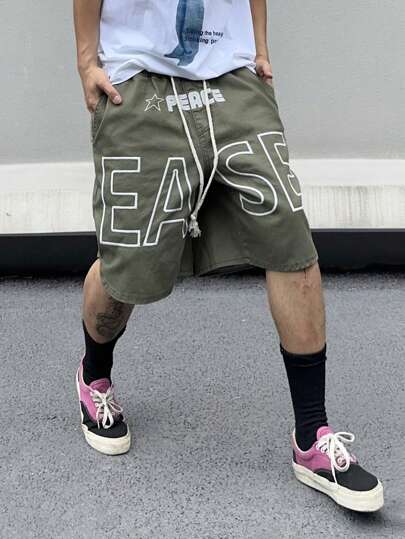 Manfinity Roghcode 男士字母印花束口牛仔短褲，帶雙側口袋