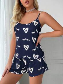 Conjunto de pijama de camiseta de tirantes y pantalón corto con estampado de corazones y pestañas