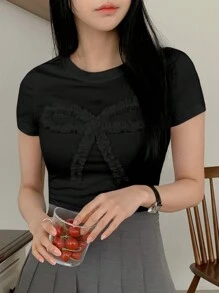 DAZY Áo thun nữ tay ngắn màu trơn mùa hè có trang trí nơ, cổ tròn, áo crop top thời trang nữ - màu đen - Xem 4