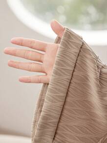 Mulvari Plus Size Women's Summer Solid Color Round Neck Drop Shoulder Sleeve Pocket Top And Wide Leg Loose Pants Two-Piece Set - Coffee Brown - View 7