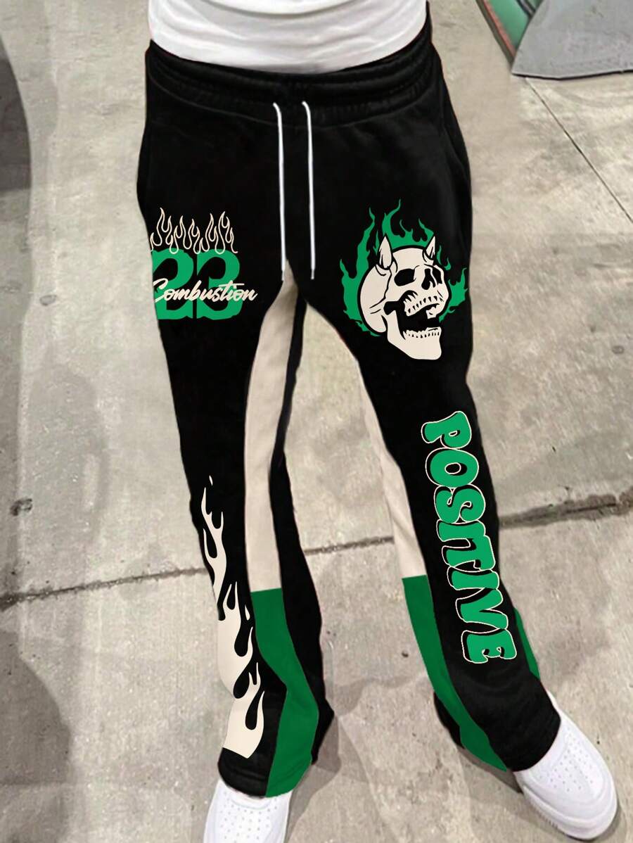 Manfinity EMRG 男士黑色街头撞色拼接骷髅火焰印花裤，外出长款宽松运动裤，适合丈夫、男朋友的礼物 - 彩色 - 查看 1