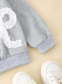 SHEIN 少女宽松大码甜美可爱韩版圆领长袖卫衣，饰有3D蝴蝶结和荷叶边，适合春秋季休闲、运动、户外活动穿着。 - 灰色 - 查看 3