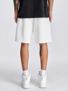 Manfinity RebelGame Pantaloncini da uomo larghi in maglia con stampa incrociata, perfetti per l'estate