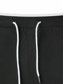Manfinity Hypemode Pantalones cortos de hombre de ajuste holgado con bolsillos oblicuos y cintura con cordón