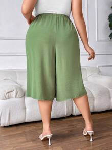 SHEIN CURVE+ Plus Size Solid Color High-Waisted Capri Pants With Pocket And Side Buttons