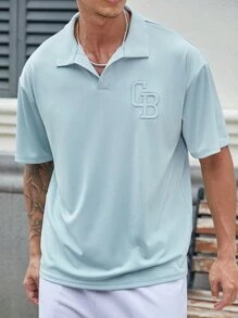 Manfinity Homme 男款天藍色鬆身Polo衫，配有刺繡領子