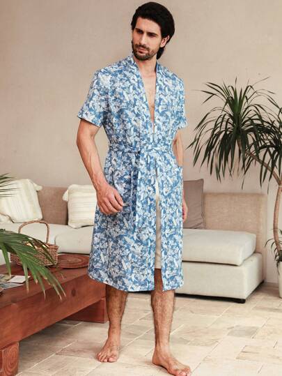 Manfinity ChillVibe Pijama largo para el hogar de manga corta estampado de plantas tropicales para hombres, estilo vacacional