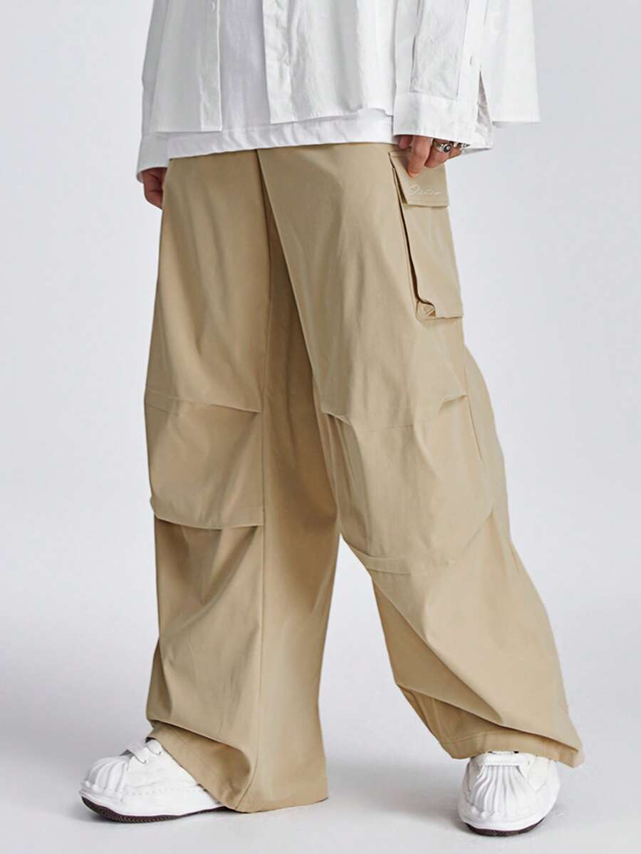 Manfinity RebelGame Quần dệt ống thẳng rộng rãi cho nam - Màu Khaki - Xem 1