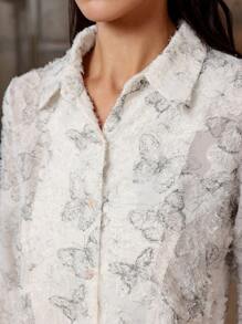 Aveloria French-Style Waist-Cinching Slimming Random Cut Flower Bell Sleeve Shirt With Unique Design