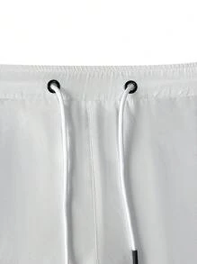 Manfinity Hypemode Pantalones cortos de hombre de ajuste holgado con bolsillos oblicuos y cintura con cordón