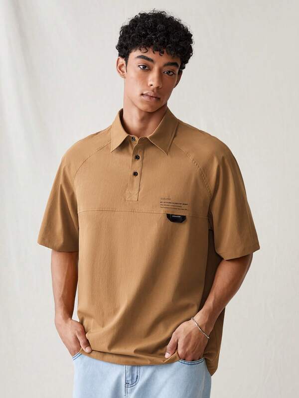 Manfinity VCAY Camisa de manga corta floja tejida para hombre, de moda casual diaria, unicolor con impresión inglesa