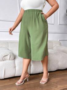 SHEIN CURVE+ Plus Size Solid Color High-Waisted Capri Pants With Pocket And Side Buttons