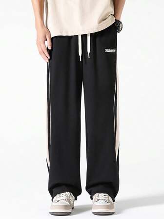 男士2024字母印花寬鬆直筒長褲，舒適時尚英俊通用款