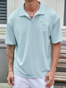 Manfinity Homme 男款天藍色鬆身Polo衫，配有刺繡領子