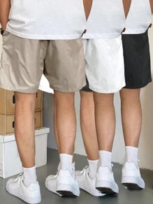 Manfinity Hypemode Pantalones cortos de hombre de ajuste holgado con bolsillos oblicuos y cintura con cordón